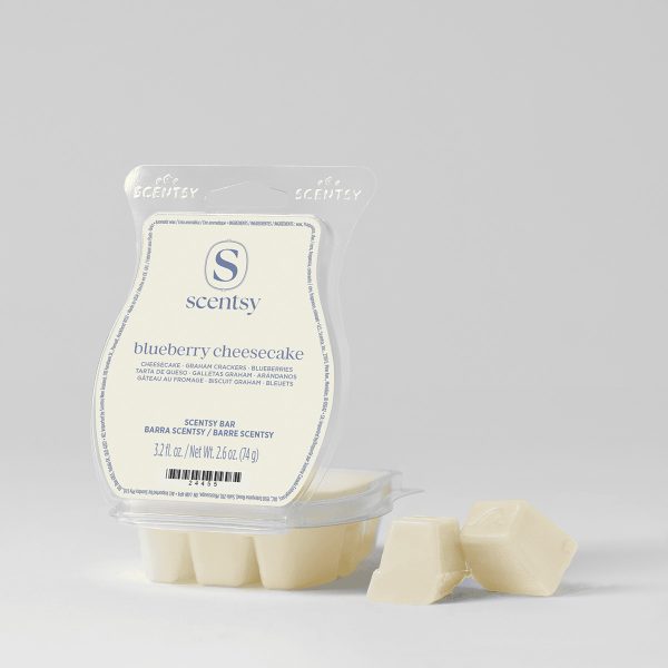 Cream-coloured wax bar segments in clear packaging with blue Scentsy branding, the Blueberry Cheesecake Scentsy Bar, with three individual cubes displayed in front