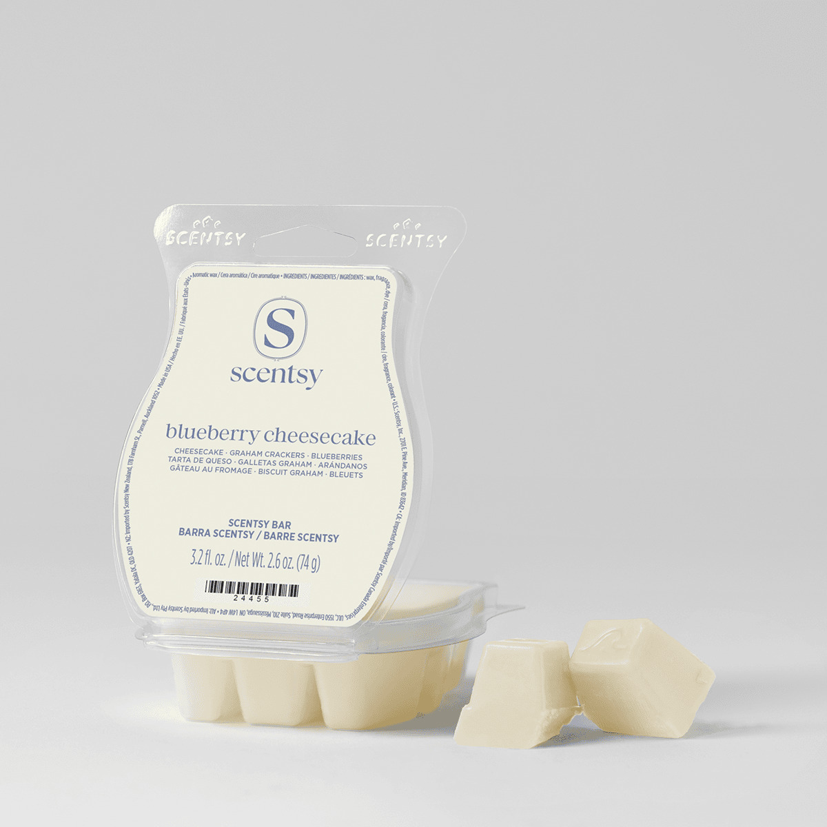 Cream-coloured wax bar segments in clear packaging with blue Scentsy branding, the Blueberry Cheesecake Scentsy Bar, with three individual cubes displayed in front
