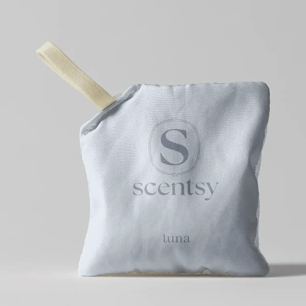 White fabric pouch with cream-coloured ribbon loop and embossed Scentsy logo, displaying "luna" text, the Luna Scent Pak