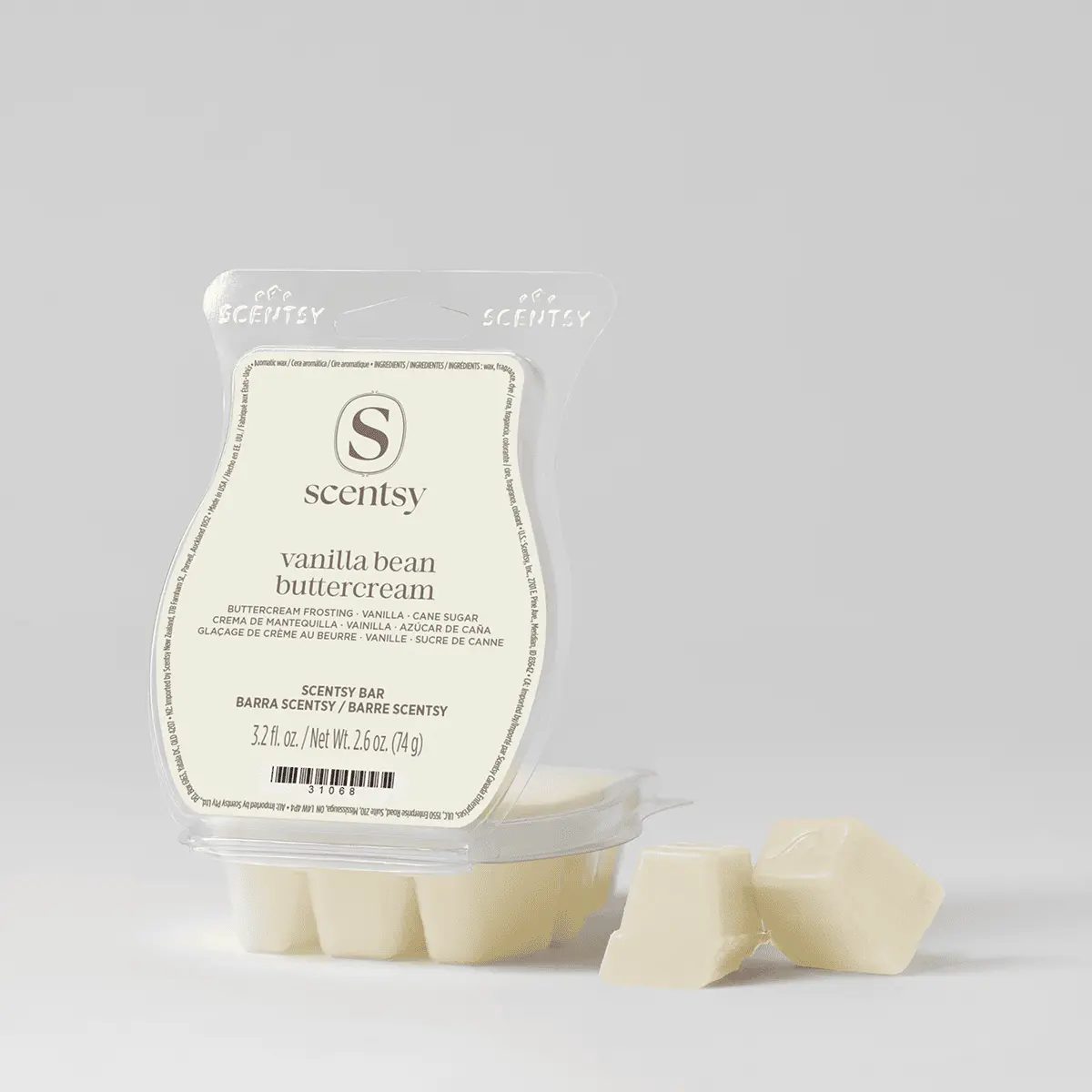 Cream-coloured wax bar segments in a clear clamshell package labelled Vanilla Bean Buttercream Scentsy Bar, with two pieces displayed in front
