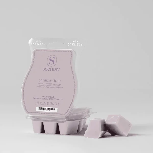 Pale pink wax bar in a clear clamshell package with Scentsy branding, the Jammy Time Scentsy Bar, shown with individual wax cubes removed and displayed in front of the packaging