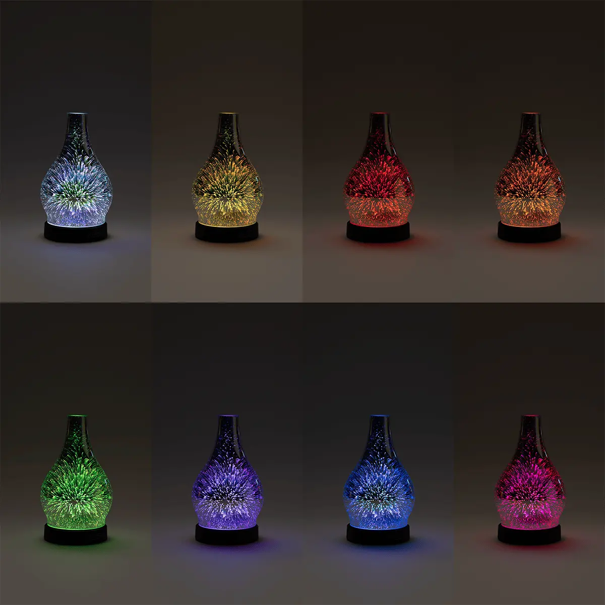 Eight glass diffusers with dimensional starburst patterns, each illuminated in a different colour: blue, gold, red, orange, green, purple, blue, and pink, each on a black base