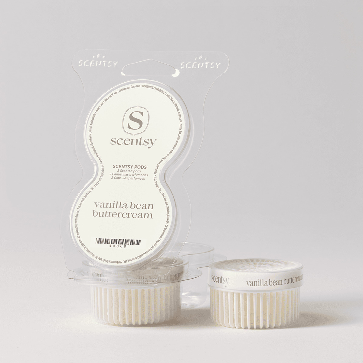 Vanilla Bean Buttercream Scentsy Pods packaging showing two cream-coloured scented pods in a clear clamshell with Scentsy branding, displayed alongside two individual ribbed pod containers with labels