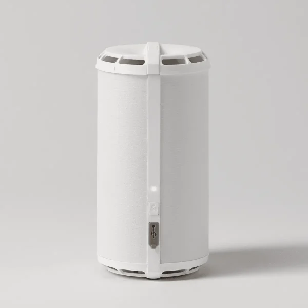 White cylindrical Scentsy Air Go+ diffuser with a hinged front panel, ventilation slots around the top and base, and a small control button on the front