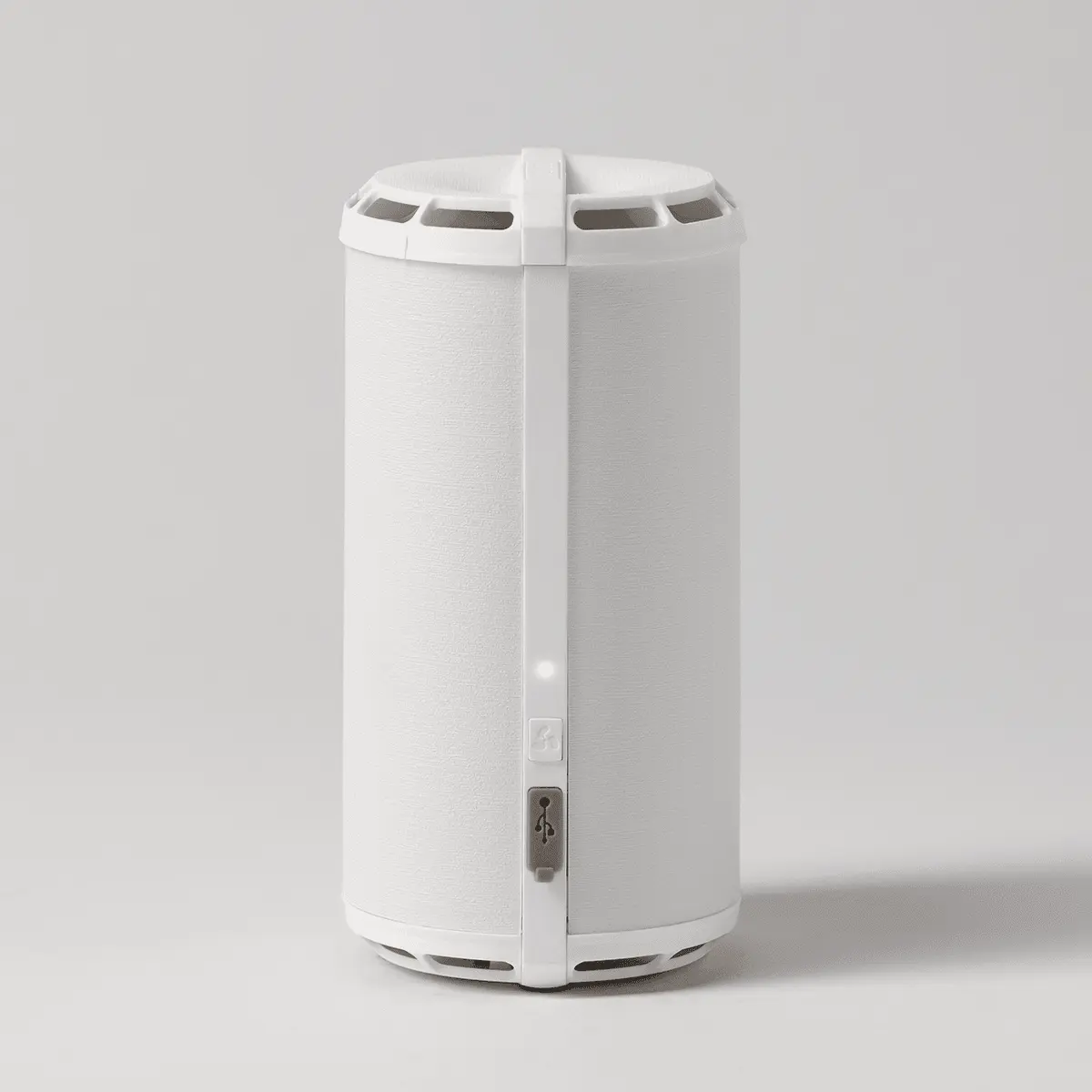 White cylindrical Scentsy Air Go+ diffuser with a hinged front panel, ventilation slots around the top and base, and a small control button on the front