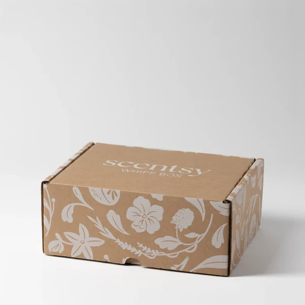 Kraft cardboard box with cream floral and botanical print design, labelled Scentsy Whiff Box on the lid