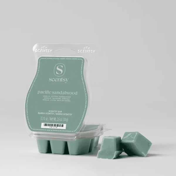 Sage-green wax bar in a clear plastic clamshell with Scentsy branding, Pacific Sandalwood Scentsy Bar, shown with three broken pieces displayed in front