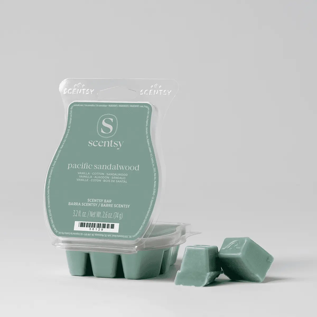 Sage-green wax bar in a clear plastic clamshell with Scentsy branding, Pacific Sandalwood Scentsy Bar, shown with three broken pieces displayed in front