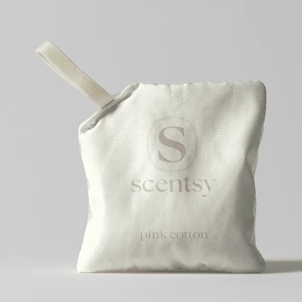 Cream-coloured fabric pouch with a ribbed drawstring handle, embossed with the Scentsy logo and "pink cotton" text, the Pink Cotton Scent Pak
