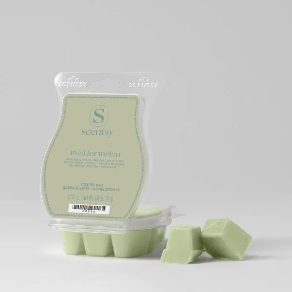 Pale green wax bar in a clear clamshell package labelled Mad for Melon Scentsy Bar, with six individual wax cubes displayed in front