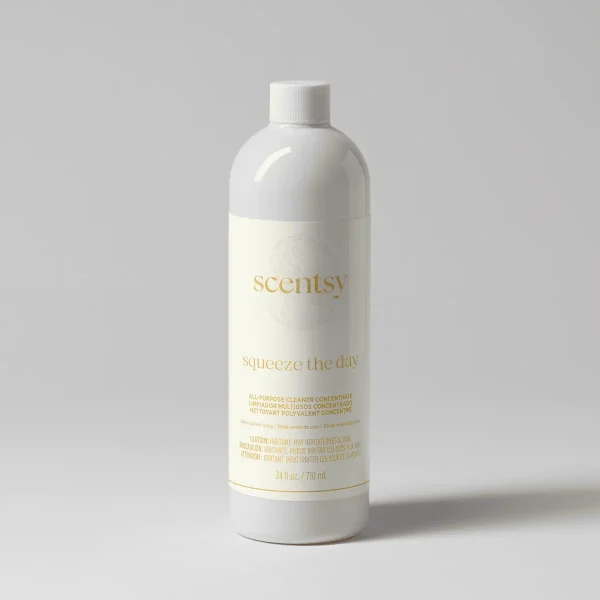 White plastic bottle with white cap and cream label featuring gold text reading "scentsy" and "Squeeze the Day All-Purpose Concentrate", 24 fl oz
