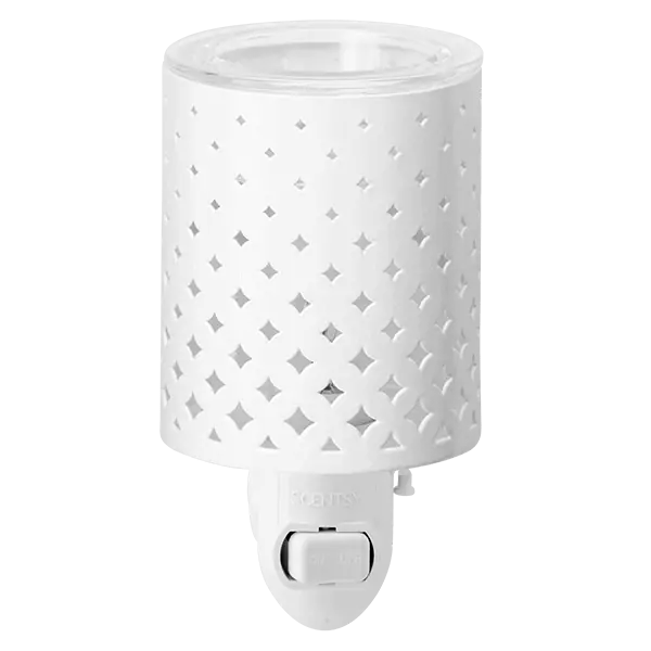White cylindrical mini warmer with an all-over geometric diamond cutout pattern that casts shadows when lit, the Light From Within Scentsy Warmer
