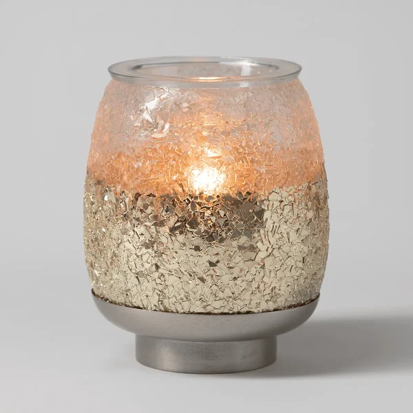 Cylindrical Scentsy warmer with a textured two-tone design featuring a champagne crackle upper half and metallic gold foil lower half, the Glisten Scentsy Warmer, with a clear glass top and brushed metal base