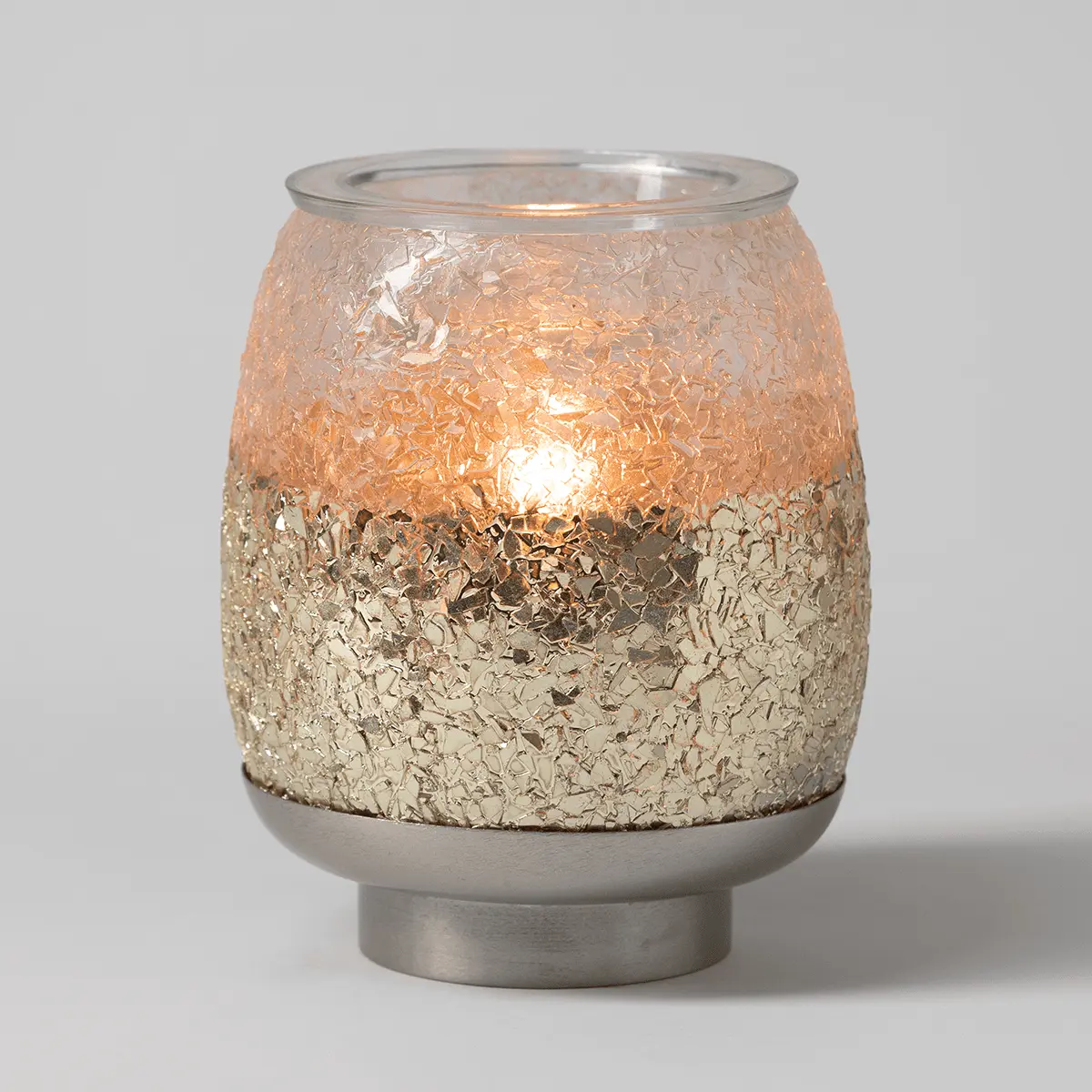 Cylindrical Scentsy warmer with a textured two-tone design featuring a champagne crackle upper half and metallic gold foil lower half, the Glisten Scentsy Warmer, with a clear glass top and brushed metal base