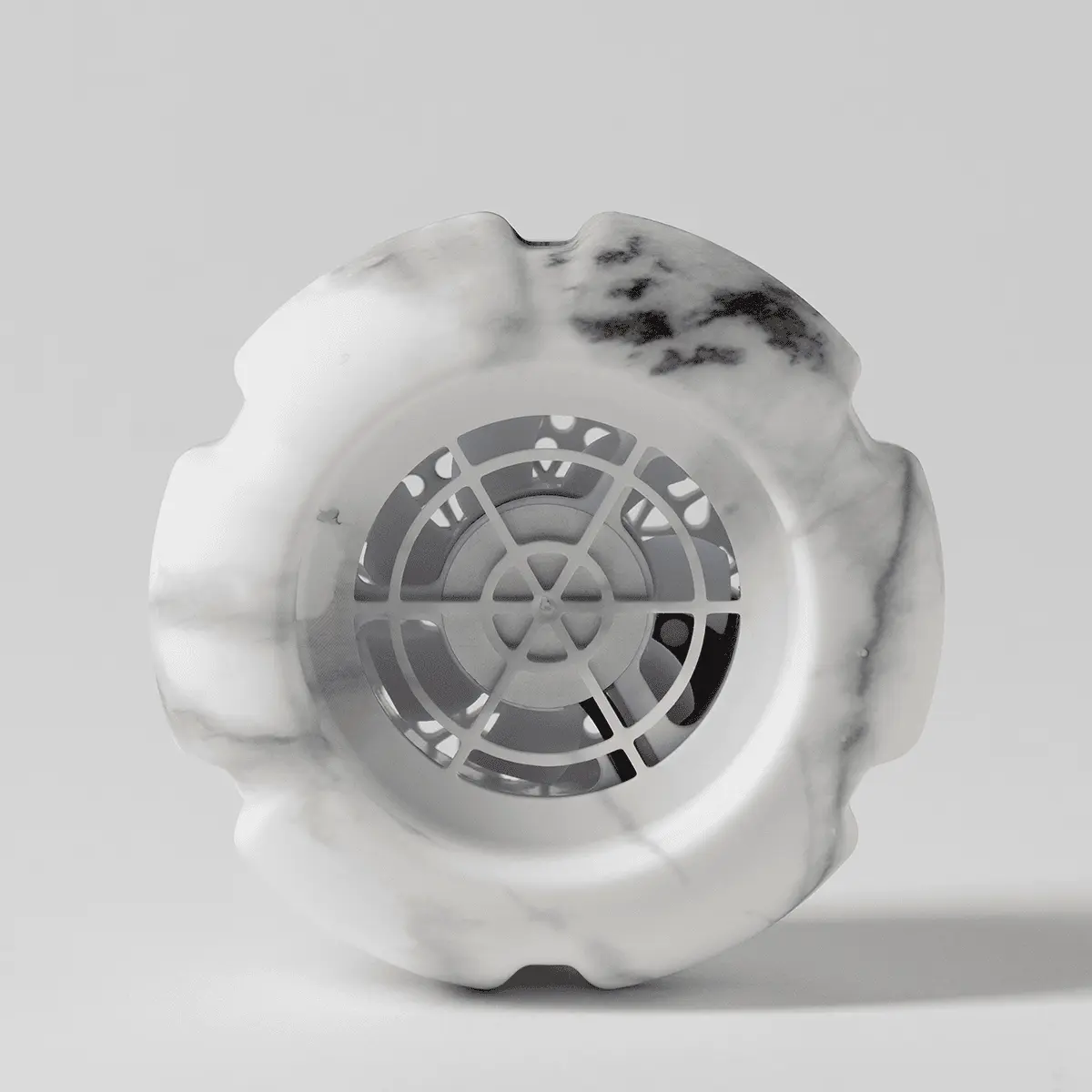 Marble white Scentsy Air Solo diffuser with organic wavy contours and a geometric concentric grille pattern at its centre