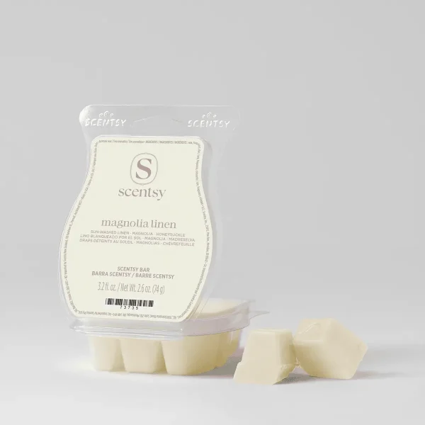 Cream-coloured wax bar segments in clear plastic clamshell packaging labelled Magnolia Linen Scentsy Bar, with three segments displayed outside the pack