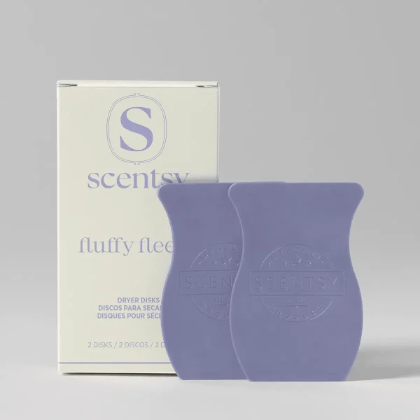Two purple waffle-textured dryer disks with embossed Scentsy branding, displayed alongside their cream and lavender packaging, the Fluffy Fleece Dryer Disks