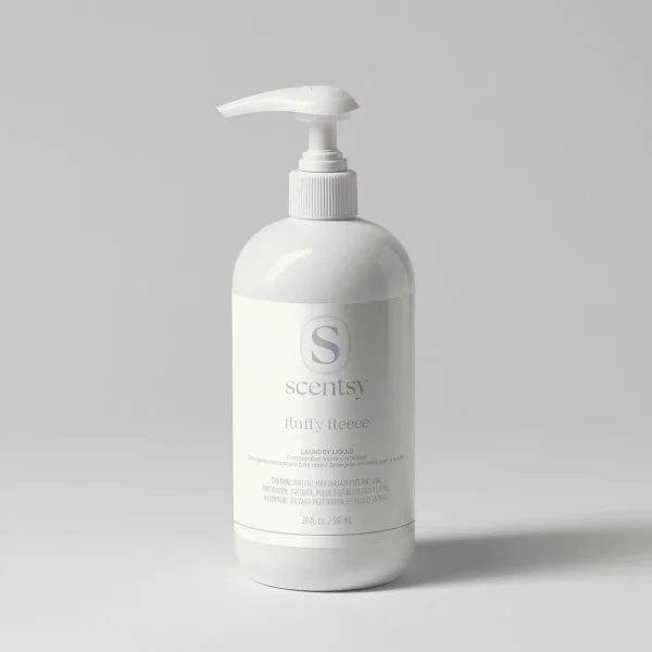 White pump bottle of Fluffy Fleece Laundry Liquid with a curved dispenser top, featuring cream-coloured labelling with the Scentsy logo and product name, 20 fl. oz. size