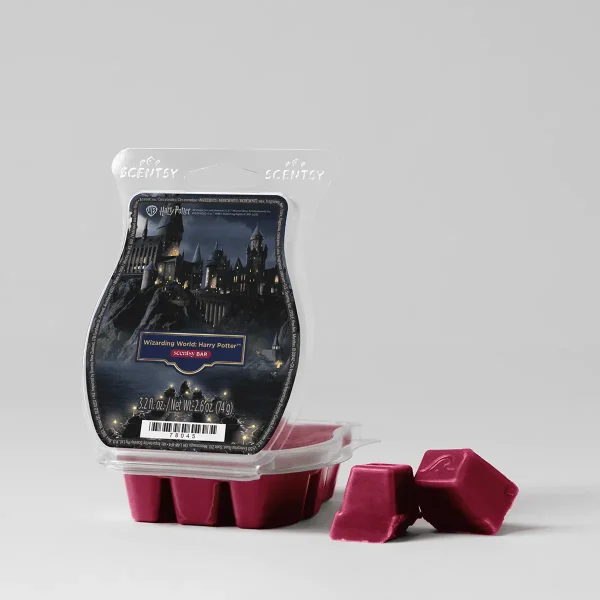 Burgundy Scentsy wax bar in a clear clamshell package featuring a dark image of Hogwarts castle illuminated at night, labelled "Wizarding World: Harry Potter Scentsy Bar", with three individual wax cubes displayed in front