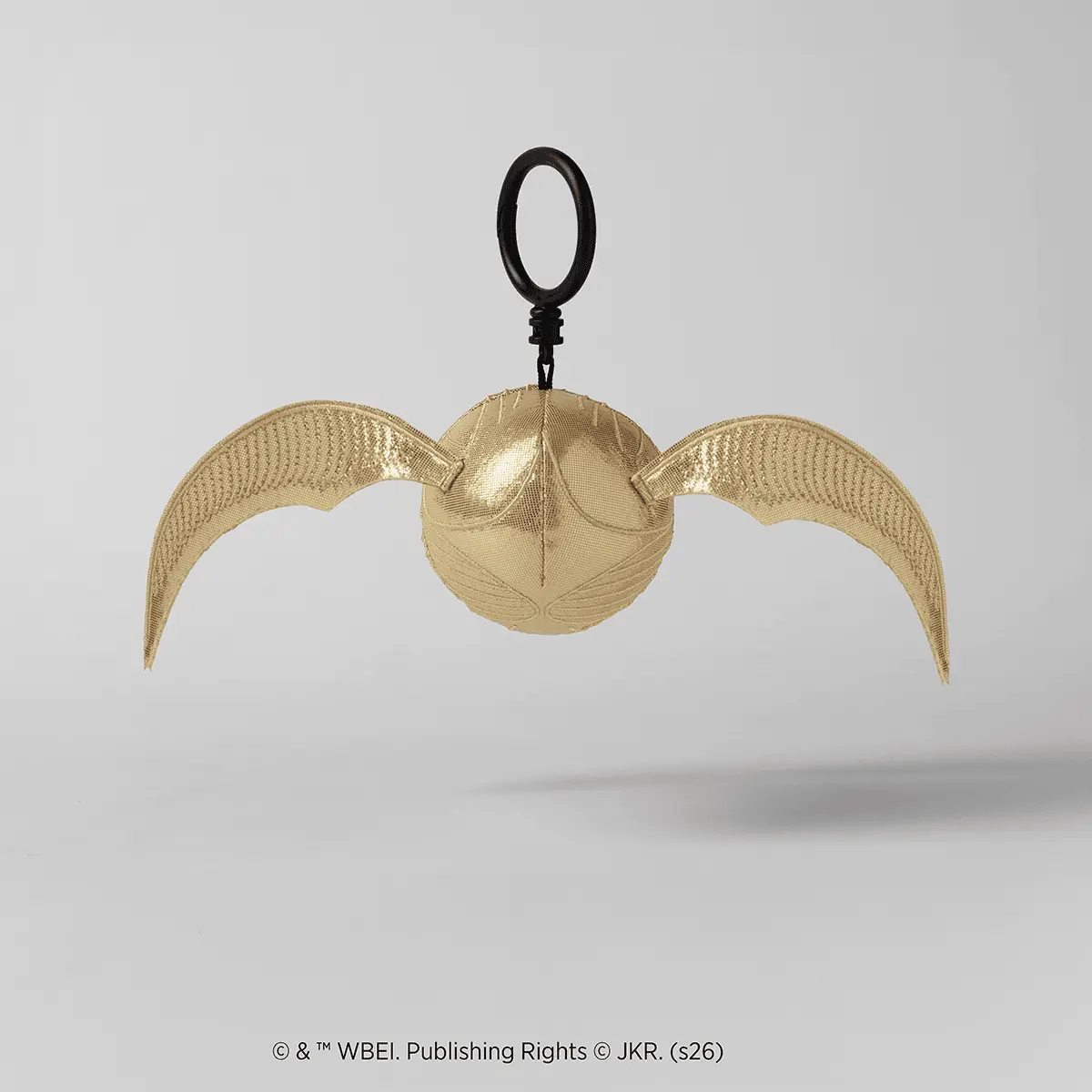 Gold textured sphere with outstretched mesh wings and a black loop attachment, the Golden Snitch Scentsy Buddy Clip