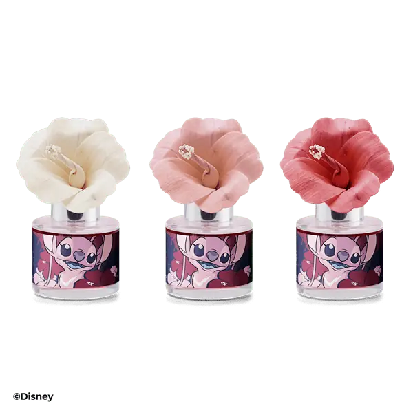 Three fragrance flowers with ruffled fabric petals in cream, light pink, and deep pink, each mounted on a purple cylindrical base featuring Disney's Stitch character illustration
