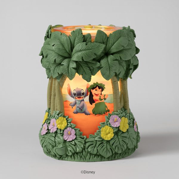 Disney Lilo & Stitch: Aloha-Ohana Scentsy Warmer - Green-leafed tropical warmer with pink and yellow flowers at the base, featuring Lilo and Stitch characters in an orange sunset scene under palm fronds, the Disney Lilo & Stitch: Aloha-Ohana Scentsy Warmer