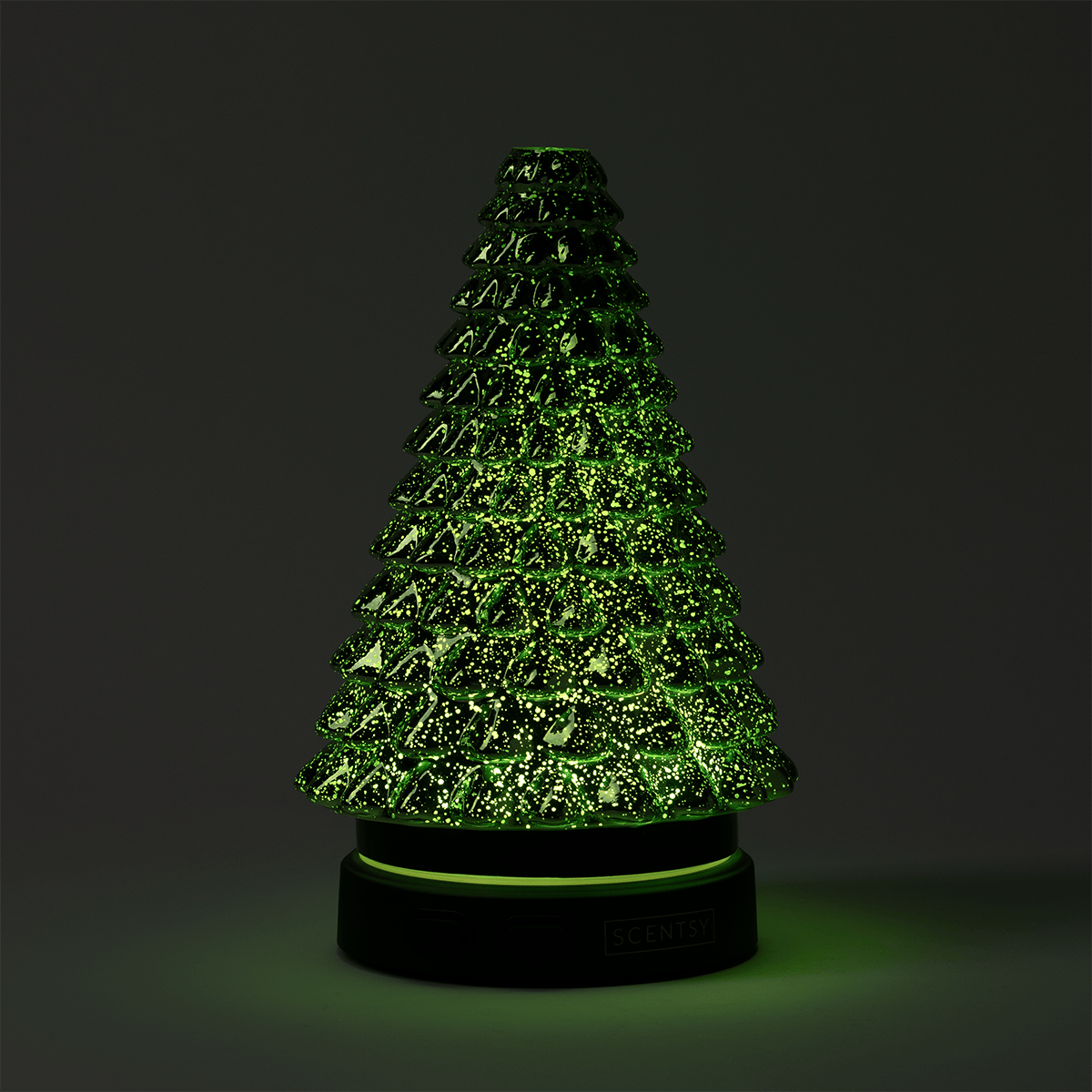 Tree-shaped diffuser with layered textured surface covered in bright green glitter, glowing green light within, dark base with illuminated green trim band