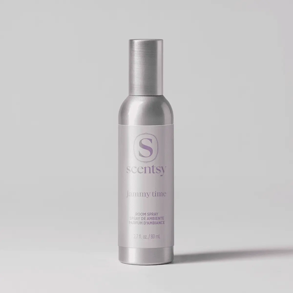 Metallic silver spray bottle with purple label featuring the Scentsy logo and "Jammy Time Room Spray" text, 80 ml size