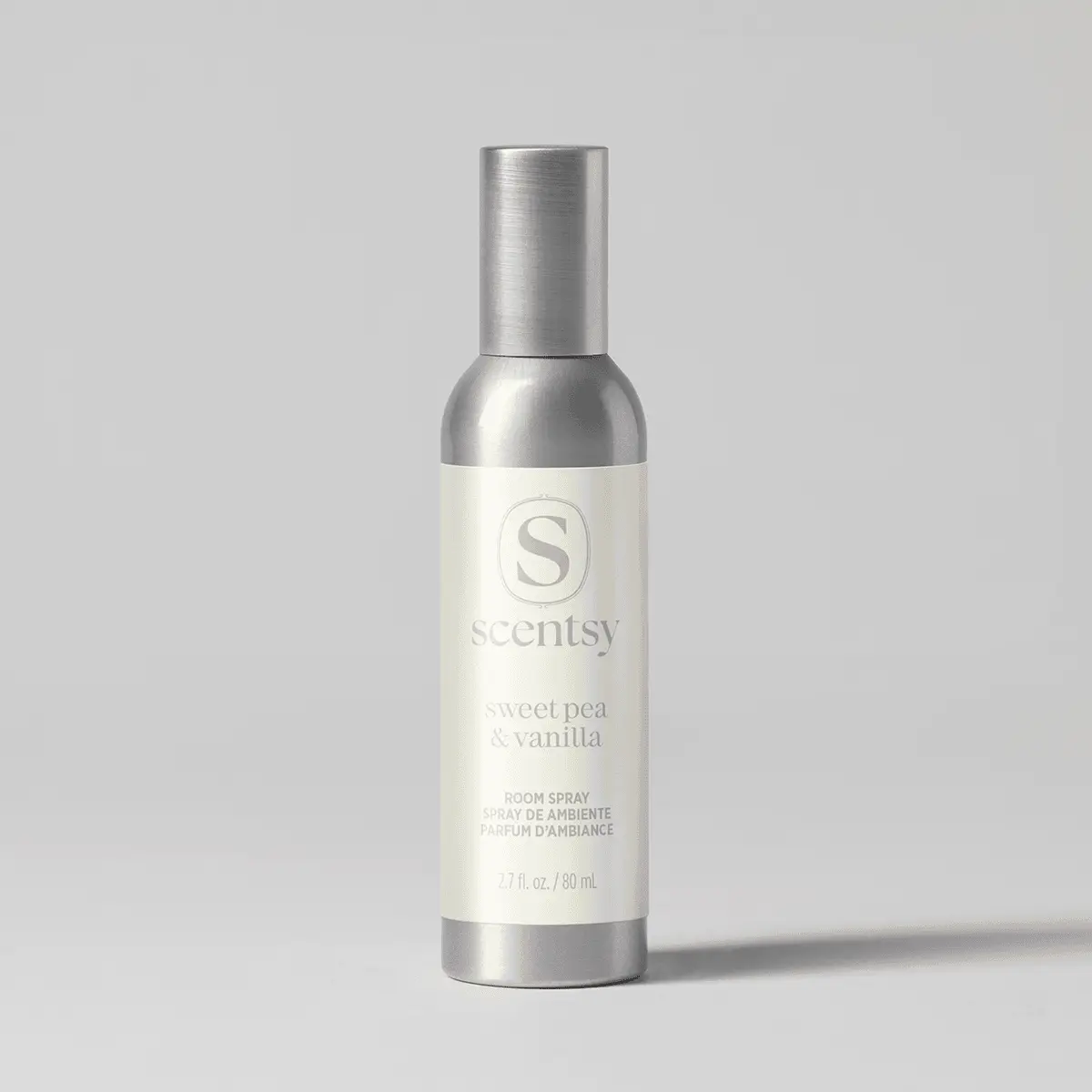 Sweet Pea & Vanilla Room Spray - Cylindrical room spray bottle with brushed silver metal cap and base, cream-coloured label with Scentsy logo, Sweet Pea & Vanilla Room Spray, 80 mL