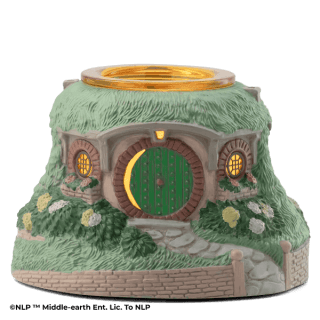Hobbit-hole shaped warmer with a grassy green exterior, round green door, stone archway and glowing yellow windows, The Lord of the Rings: Bag End Scentsy Warmer