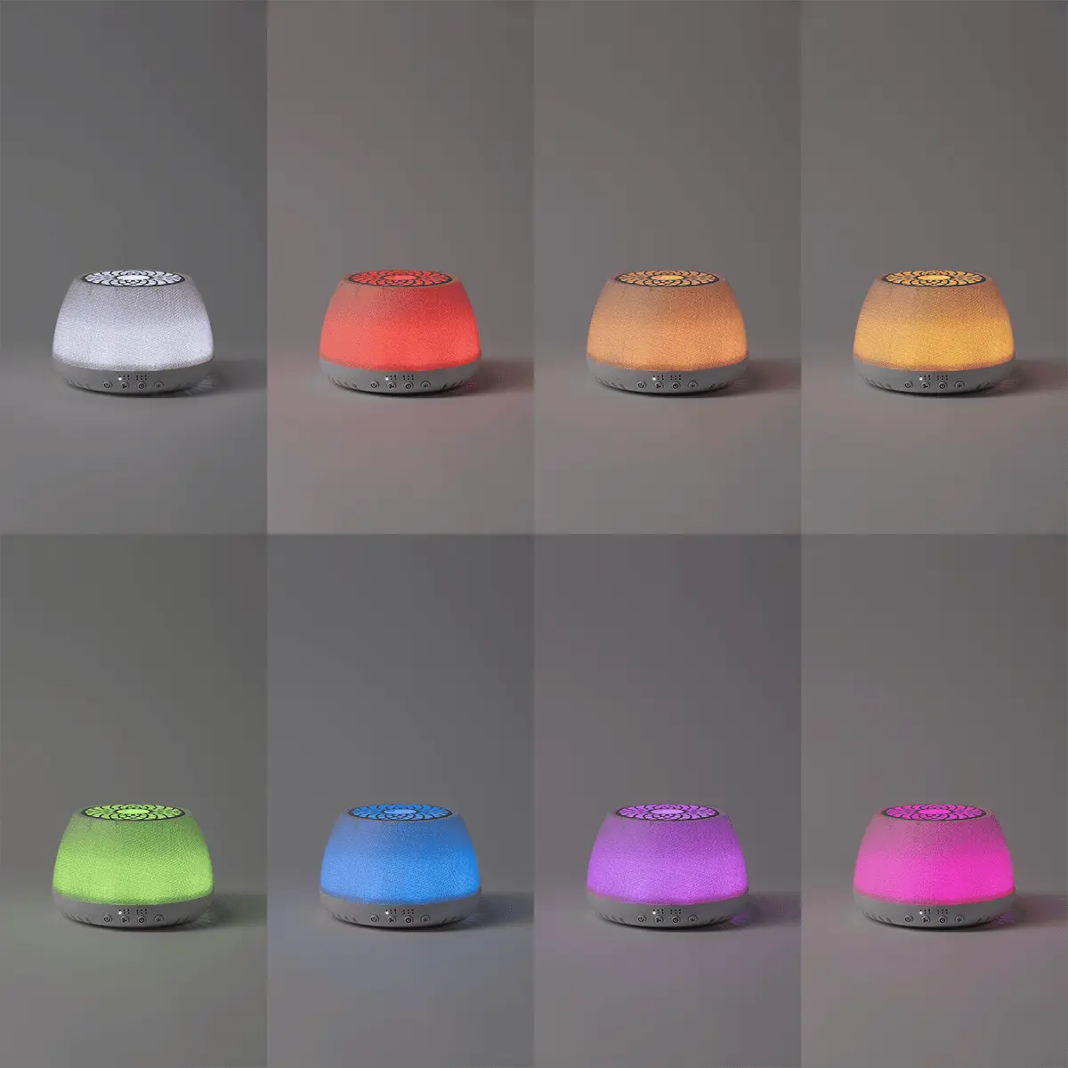 Eight Scentsy Air Quad diffusers displayed in a grid showing colour-changing light modes: white, red, peach, golden yellow, lime green, blue, magenta, and bright pink