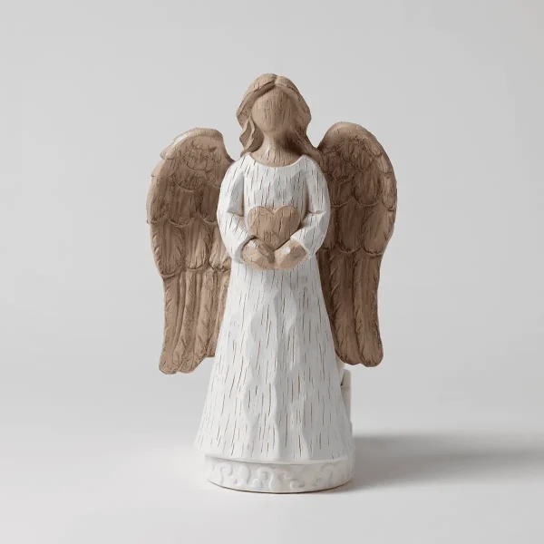 Angel Scentsy Warmer with a white textured gown, natural wood-tone wings with feather detail, and holding a heart motif, on a white base