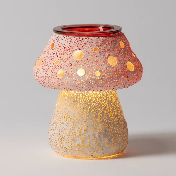 Mushroom-shaped Scentsy Warmer with a red speckled cap and cream base, both featuring perforated dot patterns that glow when lit, the Cute as a Button Scentsy Warmer