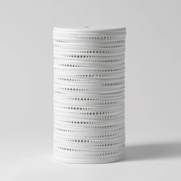 White cylindrical diffuser shade with horizontal bands perforated with small circular cutouts throughout, the Shade Only - Gleam
