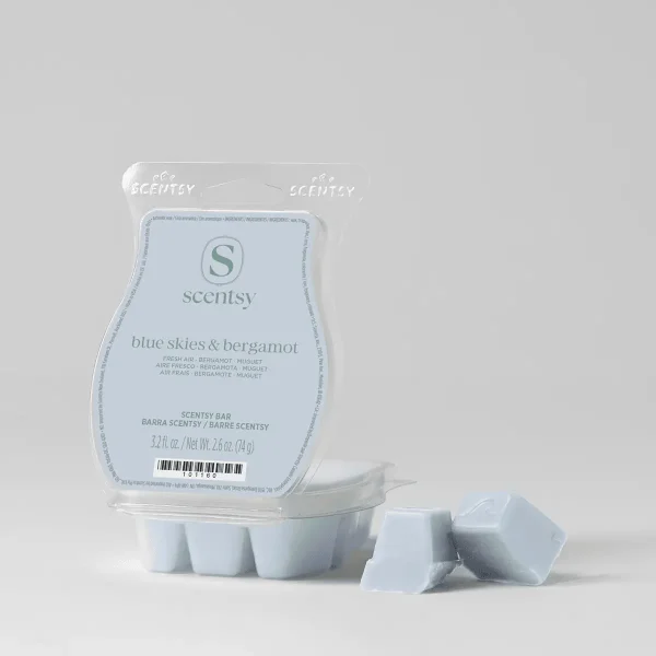 Blue Skies & Bergamot Scentsy Bar - Blue Skies & Bergamot Scentsy Bar - Light blue Scentsy wax bar in the Blue Skies & Bergamot scent, shown in its clear plastic clamshell packaging with several individual wax cubes displayed in front