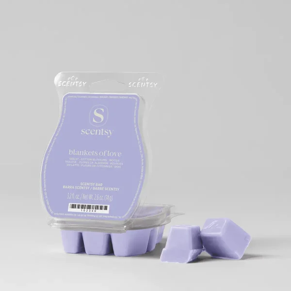 Lavender wax bar with embossed Scentsy logo in clear plastic packaging, accompanied by two loose wax cubes, the Blankets of Love Scentsy Bar