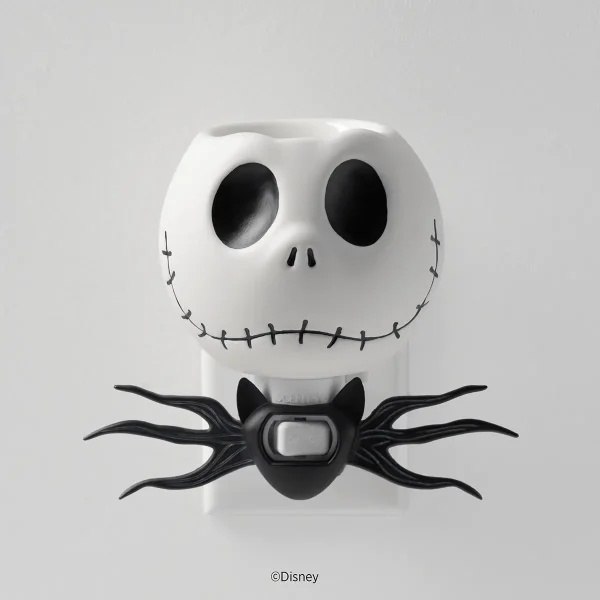 White ceramic mini warmer with large black oval eyes, stitched smile, and tiny nose details, featuring a black spiky collar, the Disney Jack Skellington Mini Scentsy Warmer