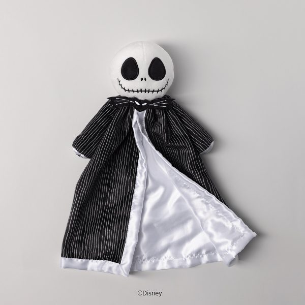 Soft plush toy with a white round head featuring large black oval eyes and a stitched smile, wearing a black pinstriped jacket with a white silk-lined cape, the Disney Jack Skellington Scentsy Blankie Buddy
