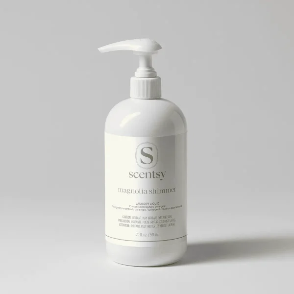 White pump bottle of Magnolia Shimmer Laundry Liquid with Scentsy branding, 20 fl oz, on a neutral grey background
