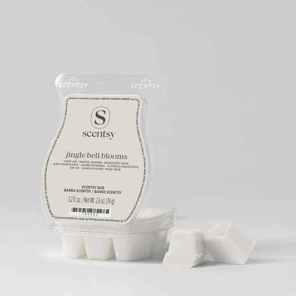 Clear plastic clamshell containing six white wax melts, labeled Jingle Bell Blooms Scentsy Bar, with product information and barcode visible on the front label