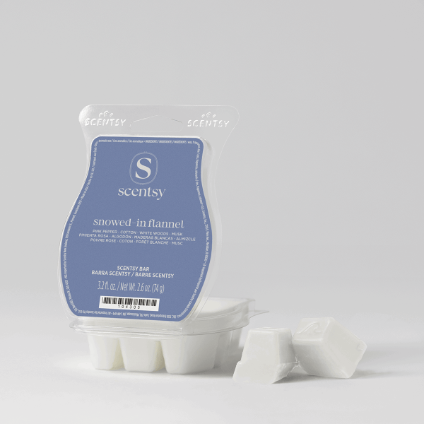 Snowed-In Flannel Scentsy Bar in clear clamshell packaging with blue label, showing white wax segments below and two individual wax pieces separated to the side