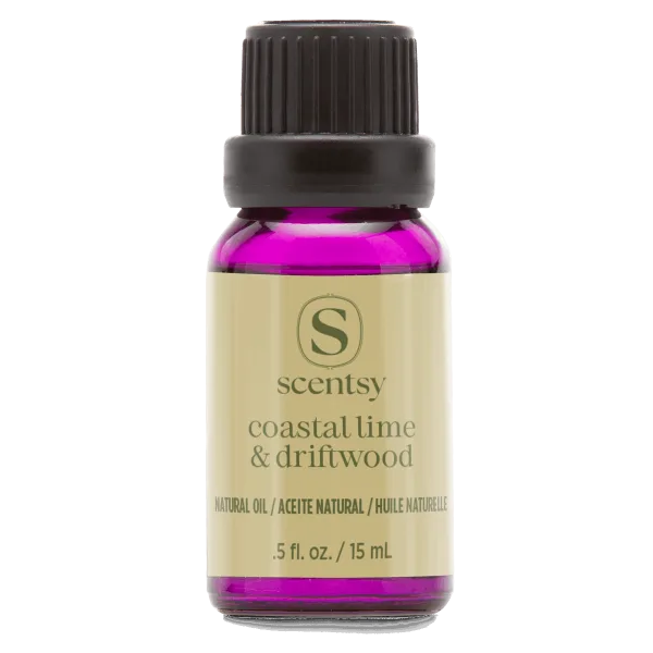 Small bottle of magenta liquid with a black cap and cream-colored label displaying the Scentsy logo and product name Coastal Lime & Driftwood Natural Oil Blend, 15 ml