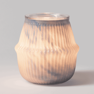 Gossamer Haze Scentsy Warmer with vertical ribbed glass texture in soft frosted peachy-white tone, rounded bulbous shape with clear rim, illuminated from within