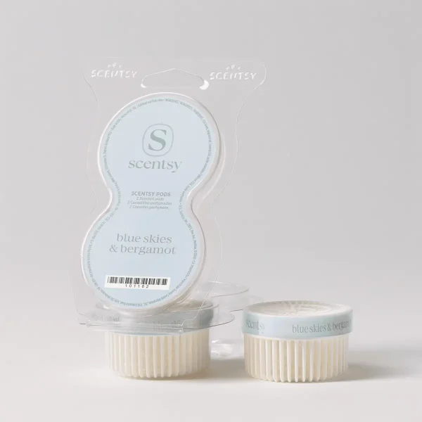 Blue Skies & Bergamot Scentsy Pods - Clear plastic clamshell packaging containing two cream-coloured ridged Scentsy Pods with light blue labels reading "blue skies & bergamot", the Blue Skies & Bergamot Scentsy Pods