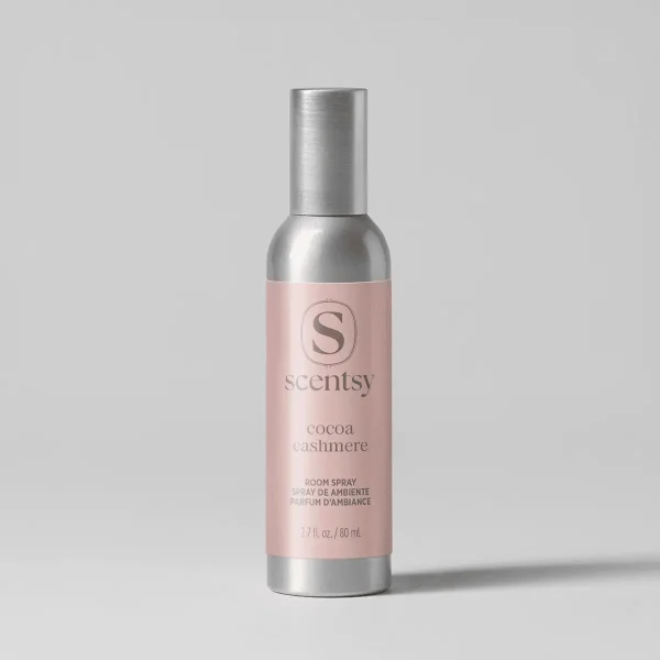 Tall metallic silver spray bottle with pale pink label featuring the Scentsy logo and "cocoa cashmere" text, the Cocoa Cashmere Scent Circle 3-pack room spray, 80 ml