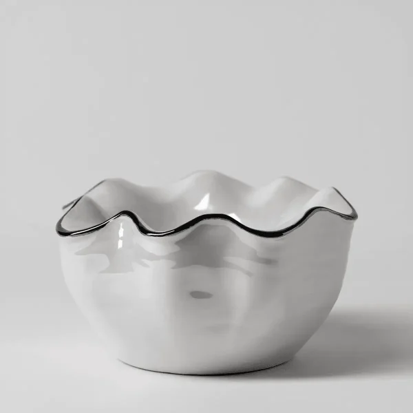 White ceramic warmer with a ruffled, wavy rim accented by a black glaze line, the Lustra Scentsy Warmer