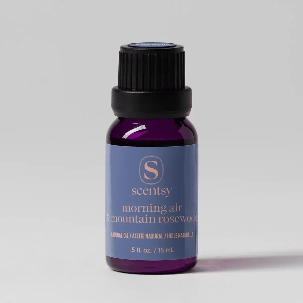Morning Air & Mountain Rosewood Natural Oil Blend - Purple glass bottle with black screw cap containing Morning Air & Mountain Rosewood Natural Oil Blend, 15 mL, with blue label featuring the Scentsy logo