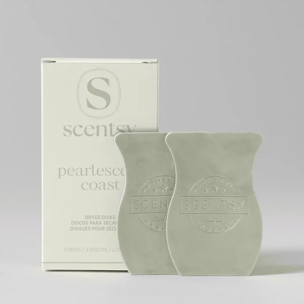 Cream-coloured waffle-textured dryer disks with embossed Scentsy branding, displayed alongside their pale cream box packaging, the Pearlescent Coast Dryer Disks
