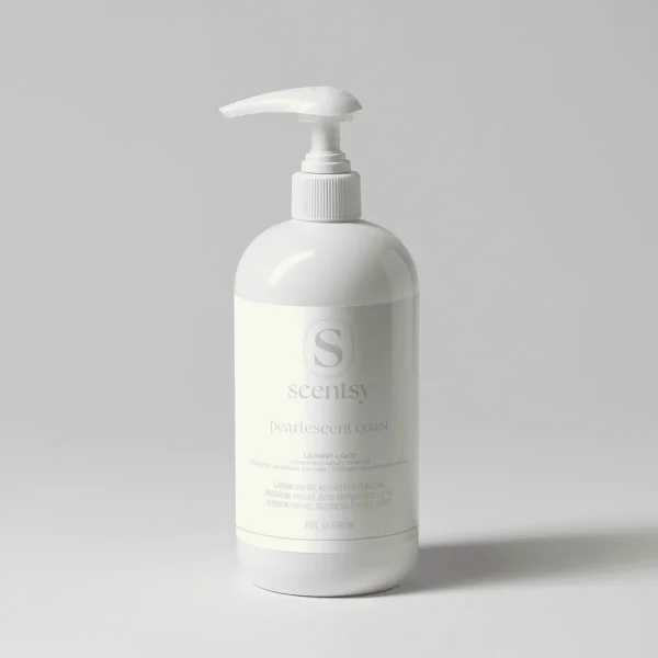 White pump bottle of Pearlescent Coast Laundry Liquid with a pale cream label and ribbed pump dispenser against a neutral background