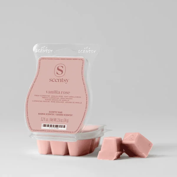 Pink wax bar in segmented clamshell packaging labelled Vanilla Rose Scentsy Bar, with two broken pieces displayed in front